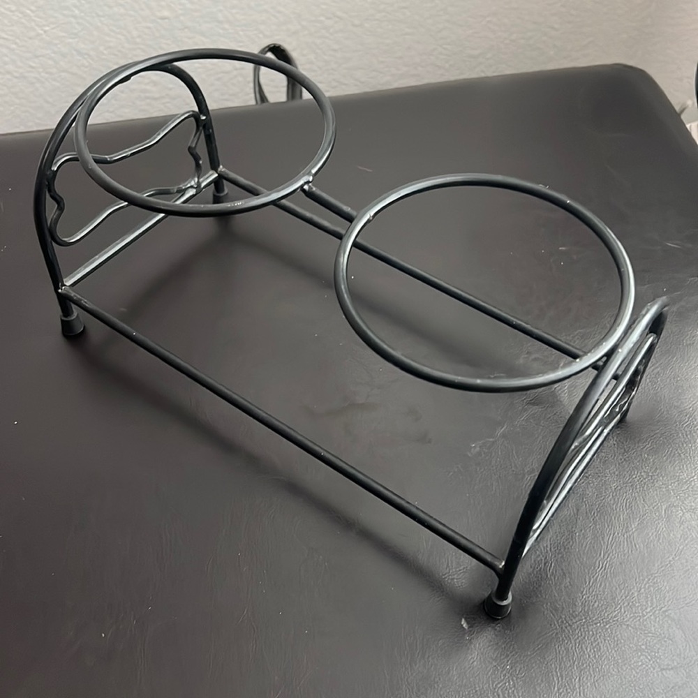 Food bowl stand for a small pet.